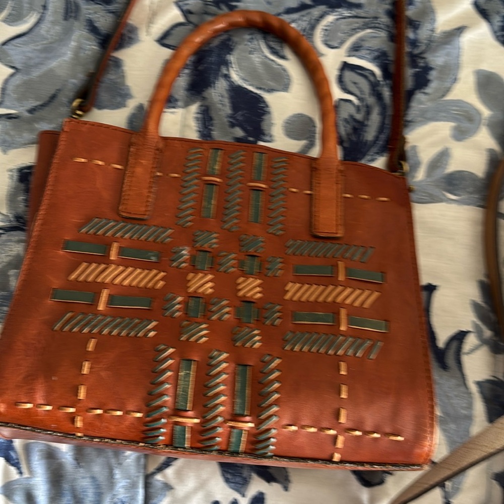 Patricia Nash leather handbag.One spot of wear,.9.5” wide
8”deep
8” tall